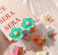 Sun clip flower earrings