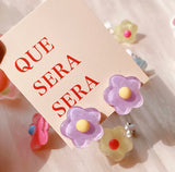 Sun clip flower earrings