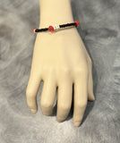 AC Black Beaded Skull and Rose Slinky Bracelet